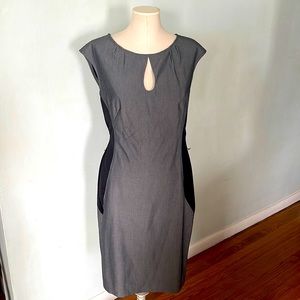 Black/grey dress with belt to sinch waist.